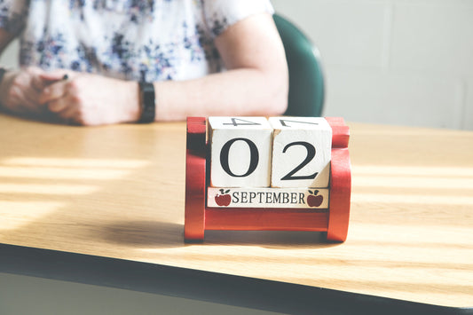 Image of a desk-top calendar featuring date "September 02"